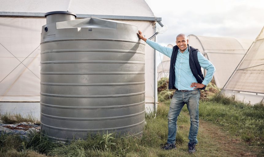 man-portrait-and-water-tank-in-farming-liquid-or-2025-04-06-10-59-00-utc